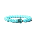 Elastic beaded bracelet with turquoise texture beads and a small turtle charm - Turquoise