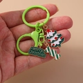 Detail of Christmas tree keychain with candy charm and gold Merry Christmas tag - Snowflake Christmas Tree