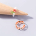 Transparent beaded ring with red fruit and clear resin ring featuring orange patterns - Apple Acrylic Ring (SE1077)