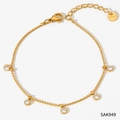 Gold stainless steel bracelet featuring five round bezel-set zircon charms with lobster clasp - Gold + Clear Zircon