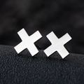 Polished silver stainless steel X-shaped geometric stud earrings for women in 18K finish - Symbol X / Silver
