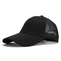 Detail view of the breathable mesh back and curved brim on this black cotton trucker hat - Black Mesh Back