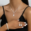 Elegant silver bridal jewelry set with pear-cut rhinestone necklace, earrings, and bracelet - Silver Single-Row Rhinestone Jewelry Set (463+G0138)