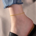 Elegante cavigliera da 1 mm in acciaio al titanio dorato scintillante dal design minimalista - Cavigliera / Oro