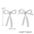 Detailed view of titanium steel bow earrings showing 4.8cm height and 3.3cm width - Steel Linear Bow (F1478)