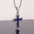 Silver iced-out cross necklace with deep blue gemstone and sparkling clear zircons - Blue / Twist Chain 60cm
