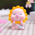 Pink resin Capybara figurine with yellow sunflower and blue crossbody bag accessory - Backpack Pig (988-13)
