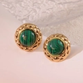 Macro detail of vintage gold stud earrings with green malachite stone and quilted pattern - Green