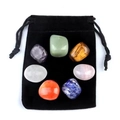 Set of seven polished natural crystal stones arranged on a black velvet drawstring pouch - Rose Quartz Rainbow Tumbled Stone Set With Velvet Bag