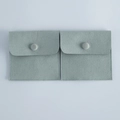 Set of two light blue velvet jewelry pouches with snap button closure for ring storage - 8x8cm / Light Green