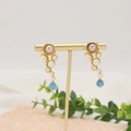 Elegant gold drop earrings with purple pearls and aquamarine bead on T-stand - Aquamarine Purple Grape Earrings