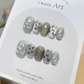 Unghie finte artigianali con motivi di farfalle e bambù, finitura cat eye chic - Sempre più in Alto (BY1386) / 30 Pezzi/Confezione (Tipo di Colla per Fototerapia)