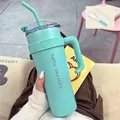 40oz stainless steel coffee tumbler in mint green with ergonomic handle and straw - 40oz / Blue