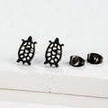 Macro shot of minimalist black turtle stud earrings with intricate cutout shell design - Turtle / Black