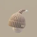 Close-up of camel knit baby hat with white pompom and soft textured ear flaps - Christmas Horn Hat Khaki (for Children Aged 2 Months To 2 Years)