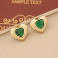 Elegant gold-plated heart earrings with emerald green gemstones on vintage leather - Green