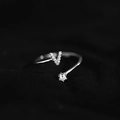 Elegant silver open ring featuring a sparkling Zirconia V letter and round main stone - Letter V