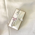 Silver micro-set butterfly pearl bracelet and ring set with pink bow detail - Pink