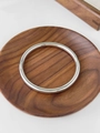 Minimalist silver lattice pattern bangle in high-polish stainless steel finish - Silver Polished