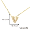 Gold plated copper necklace featuring a V-letter pendant set with zircon stones - Gold Letter-V