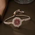 Women's gold quartz watch with red flower dial and pearl crystal strap accents - Rose Gold Red Face