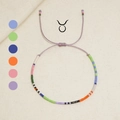 Handgefertigtes gewebtes Stier-Tierkreis-Armband mit bunten Perlen und lila Kordel - Stier (MI-Serie)