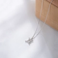 S925 sterling silver Gemini zodiac pendant necklace with diamonds on a beige jewelry box - Gemini Silver Color
