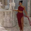 Detail of burgundy one-shoulder ruched crop top and high slit skirt set in soft knit - Burgundy