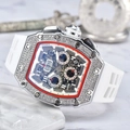 Close-up of luxury tonneau-shaped watch with diamond bezel and white rubber strap - White Dial Silver Case White Strap