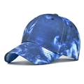Detailed view of the blue and white tie-dye pattern on this stylish cotton baseball cap - Blue Tie Dye