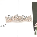Elegant gold bow hair clip with sparkling rhinestones and crystal marquis stones - Double Butterfly White