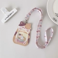 Detail of cute cat-shaped PU leather card holder with matching lanyard and pastel colors - Orange Cat