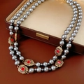 Detail of vintage double-layer necklace with dark grey pearls and red gemstone pendant - Double Layer Necklace (Gold-Grey-Red Gem)