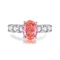 Elegant s925 silver ring featuring an oval-cut pink gemstone and white zircon accents - US 6 / Padparadscha Pink