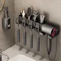 Gunmetal grey wall mounted toothbrush holder with toothpaste dispenser and hairdryer rack - Gunmetal Grey | 4 Slots + Toothpaste Dispenser + Hair Dryer Rack