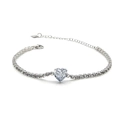 Macro shot of silver heart-shaped gemstones and crystal tennis chain with lobster clasp - White