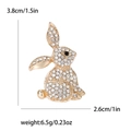 Broche de conejo dorado con diamantes de imitación y ojo negro, mide 3,8 cm - Dorado