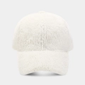 Close-up of soft beige faux mink fur texture on a minimalist baseball cap front view - White