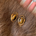 Retro golden tiger eye oval stud earrings displayed on brown fur texture background - 36# Silver Earring Post - Gold Coffee