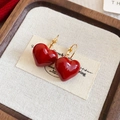 Detail of red enamel heart-shaped earrings with gold hooks on a beige textured fabric - Heart Ear Buckle (22#)