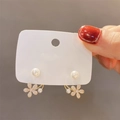 Detail of floral earrings with pavé crystals, white pearls, and gold-plated metal base - No.9 Pave Rhinestone Flower (XXX5948)