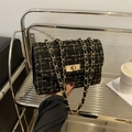 Classic tweed chain shoulder bag in black and yellow woven pattern with gold lock - Black