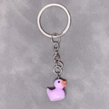 Minimalist purple resin duck keychain with silver metal ring on grey textured background - 28mm Ring / Purple