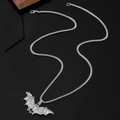 Detail of silver bat pendant with intricate wings on a matching box chain necklace - Exquisite Bat Style (2846)
