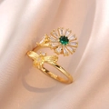 Close-up of golden sunflower ring with green gemstone center and tiny bee detail - Bee Sunflower Ring (J0231)