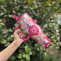 Insulated stainless steel travel mug with handle and floral patterns in pink finish - 40oz / Floral Wood