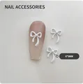 3D matte white ribbon bow nail charm 6x9mm on nude pink gradient manicure nail art - Small-White