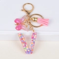 Resin letter V keychain with pink sequins, butterfly pendant and leather tassel - Letter V