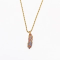 Detailed close-up of a bohemian turquoise pendant with golden twist chain necklace - Colorful Swirl