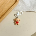 Dettaglio di un simpatico portachiavi a forma di cucciolo marrone con cuore rosso - Con Cuore (Cucciolo Marrone)
